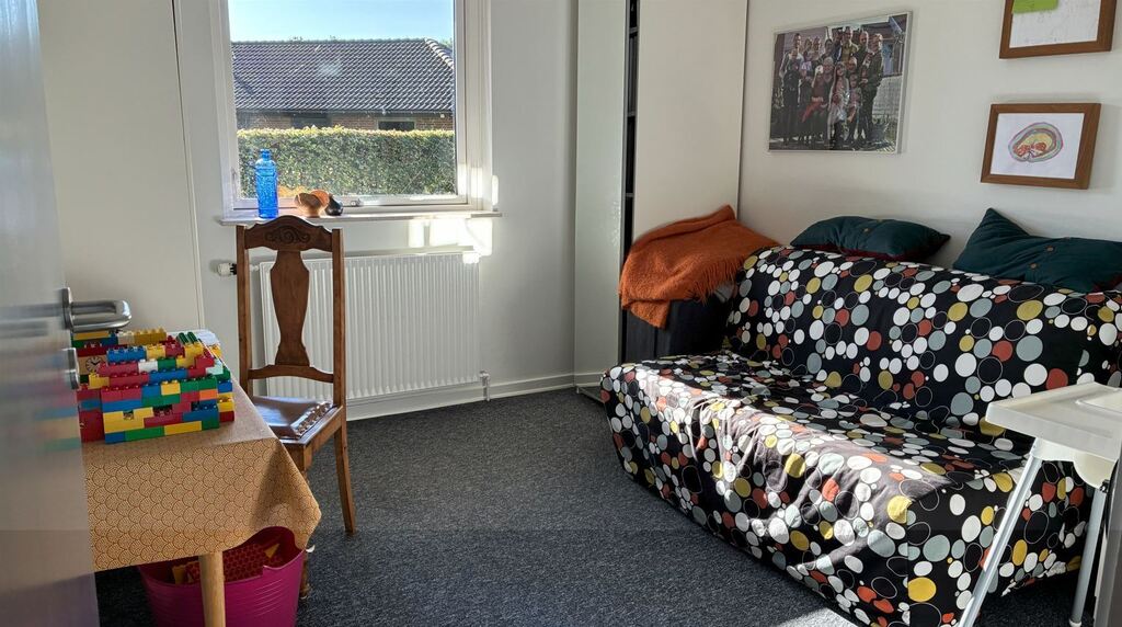 Room with futon and toys