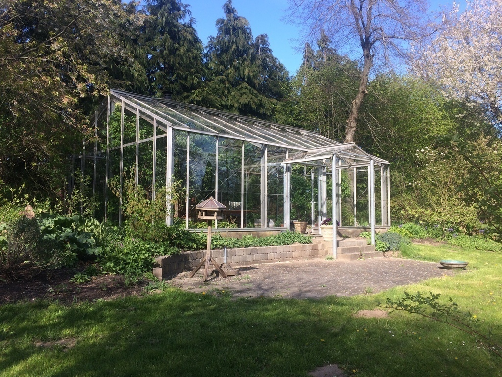 Glass house in the garden