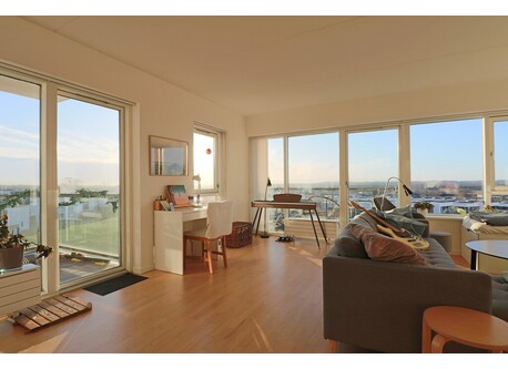 Windows towards east and south in the living room