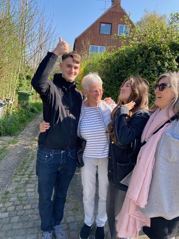 Here I am with my grown up kids and my mother outside my house.