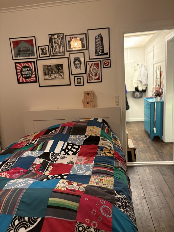 The bedroom.
The bed is 140 cm wide.