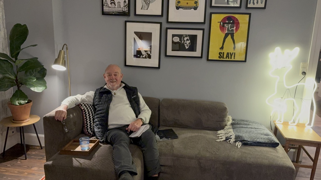 My dad visiting and enjoying the soft sofa.