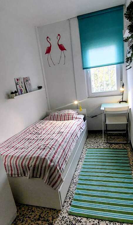 the second bedroom with a pull-out bed