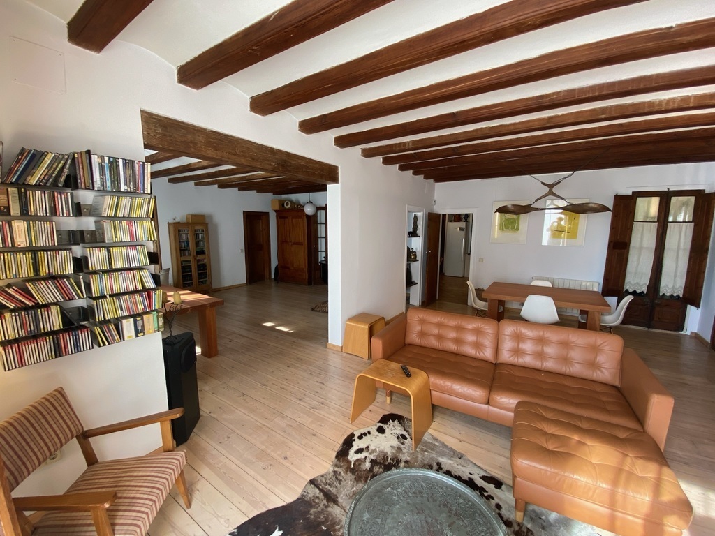 (Downstairs) Living Room Space 1, with small dining table and TV area - 4/5