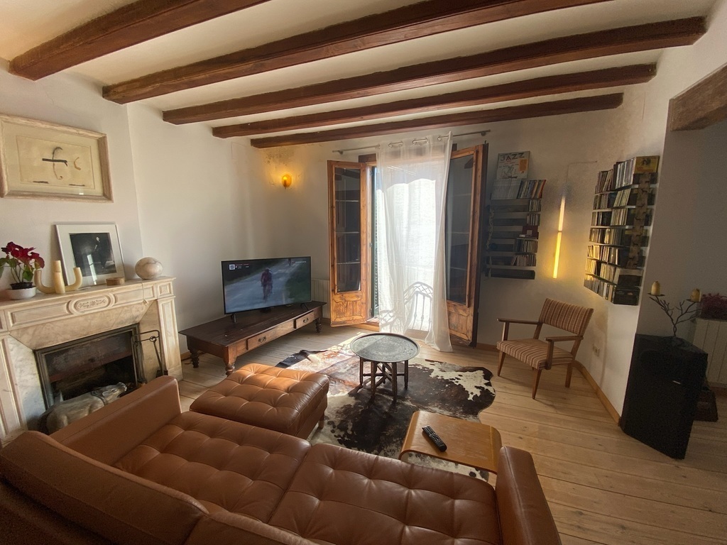 (Downstairs) Living Room Space 1, with small dining table and TV area - 2/5