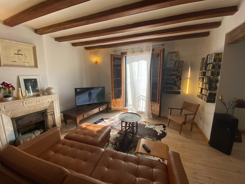 (Downstairs) Living Room Space 1, with small dining table and TV area - 2/5