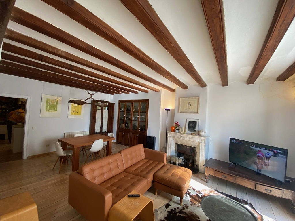 (Downstairs) Living Room Space 1, with small dining table and TV area - 3/5