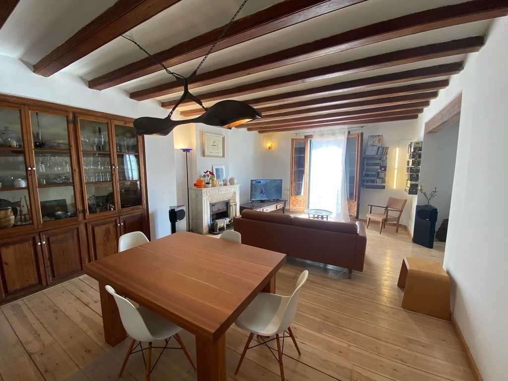 (Downstairs) Living Room Space 1, with small dining table and TV area - 1/5