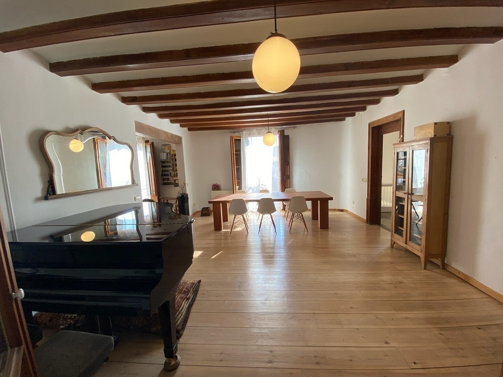 (Downstairs) Living Room Space 2, with piano and large dining table - 5/5