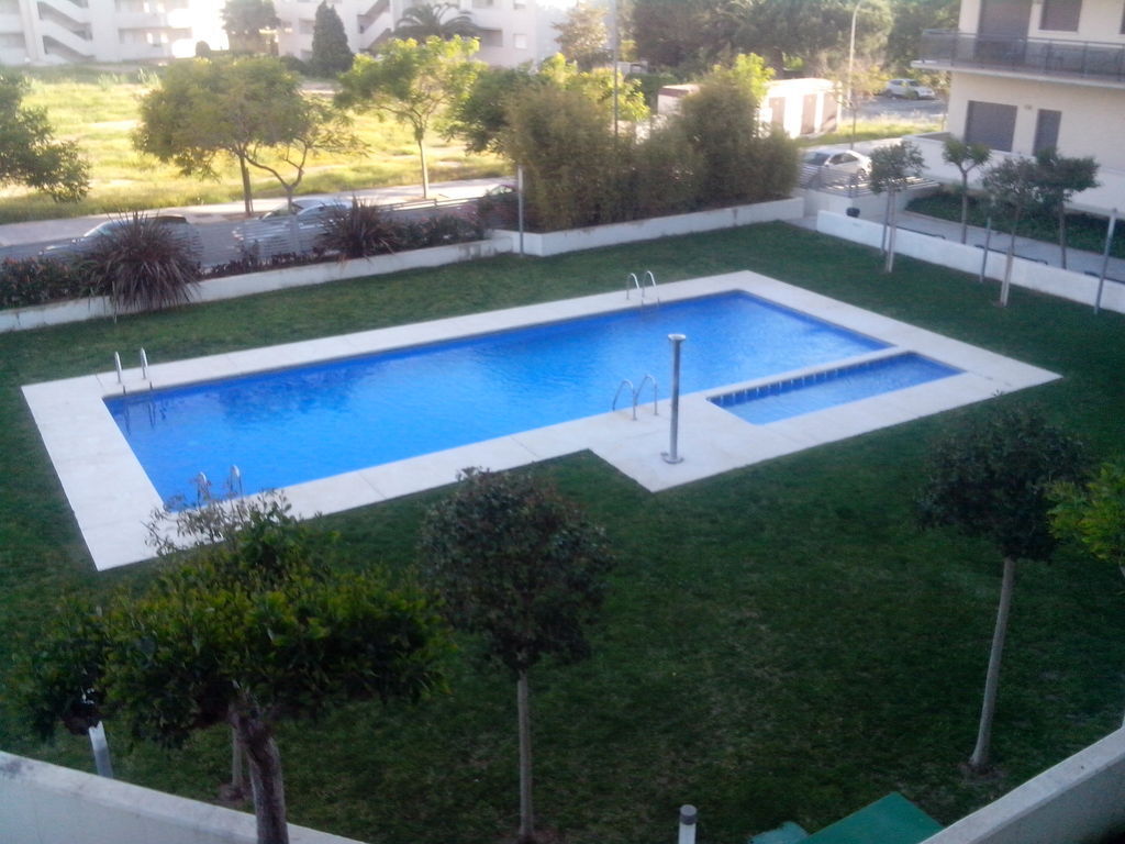 Swimming pool with two parts, one for little children