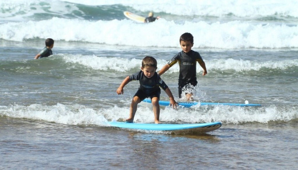 Children surfing in Zarautz