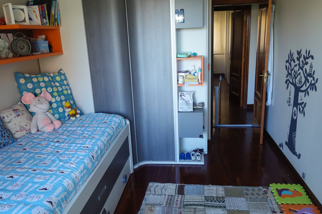 Our son's bedroom has two single beds