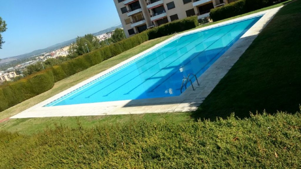 swimming pool (shared with neighbours, access included with the house)