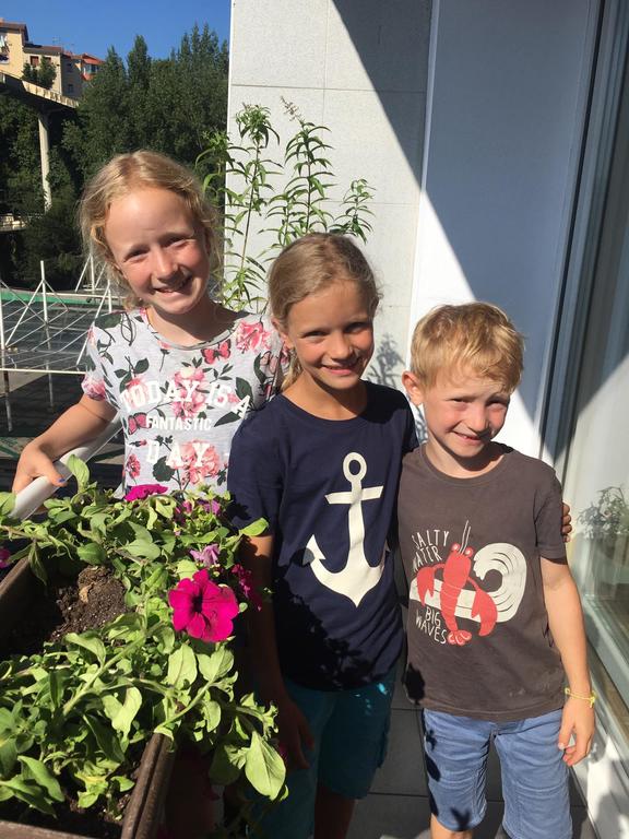 Our little sunny balcony with Swiss Intervac friends!