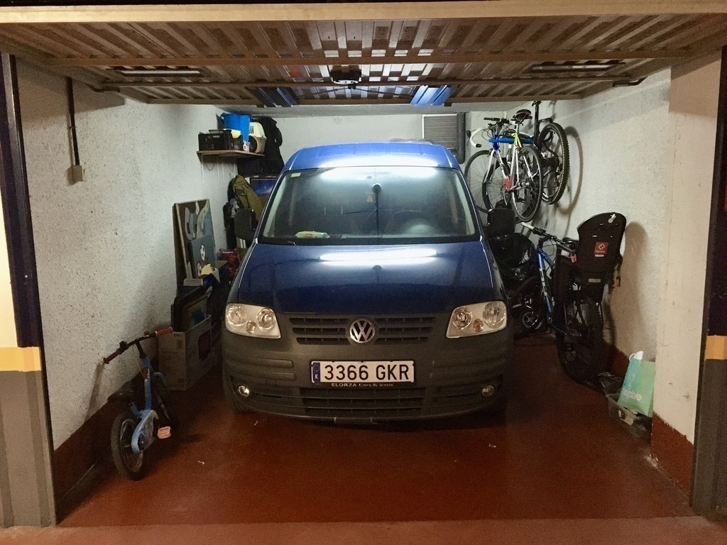 Garage with bikes, camping tent...