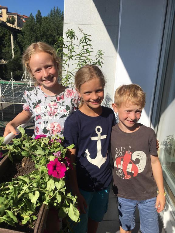 Our little sunny balcony with Swiss Intervac friends!