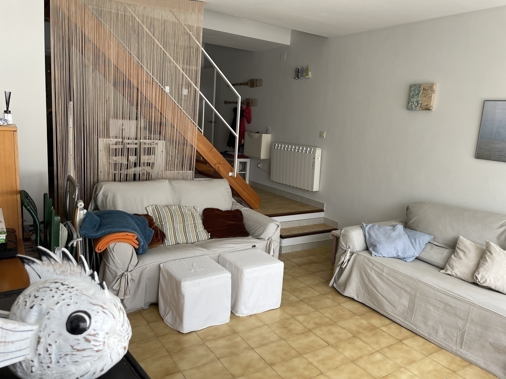 Living room, view to the stairs and kitchen