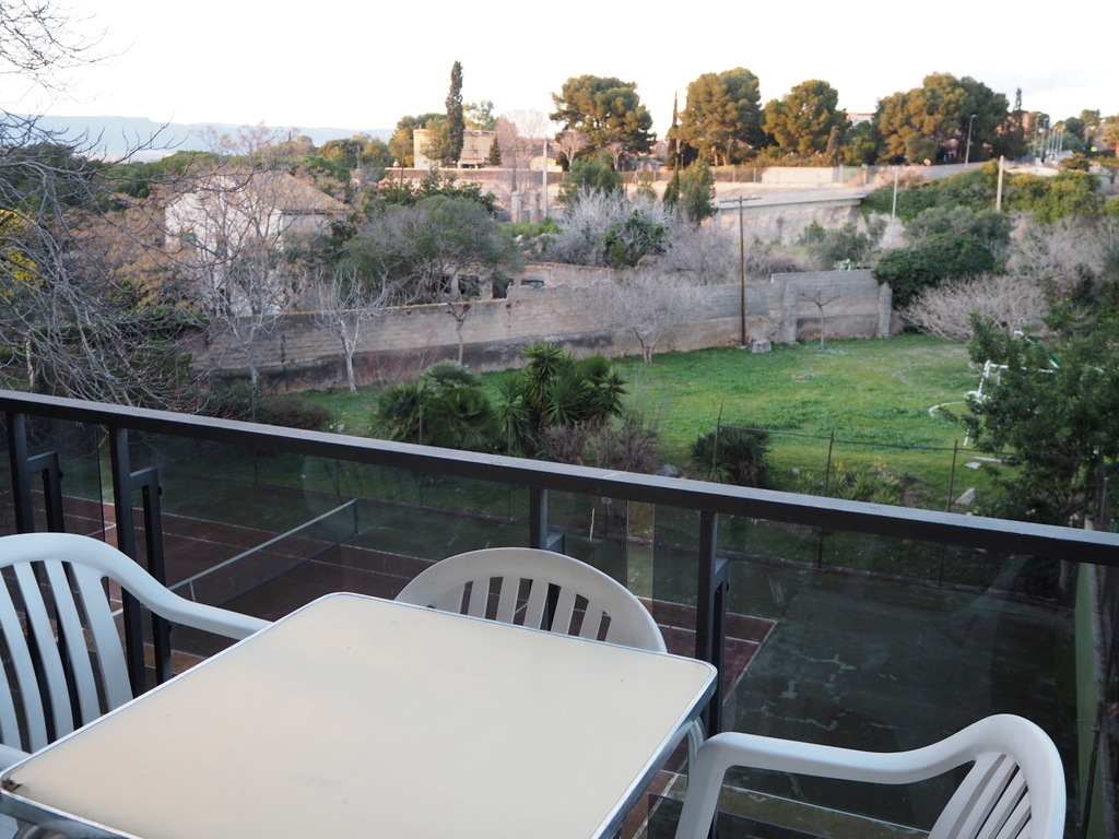 Small terrace with table and chairs