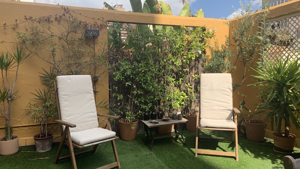 Patio: two very comfortable armchairs for reading and a glass of wine