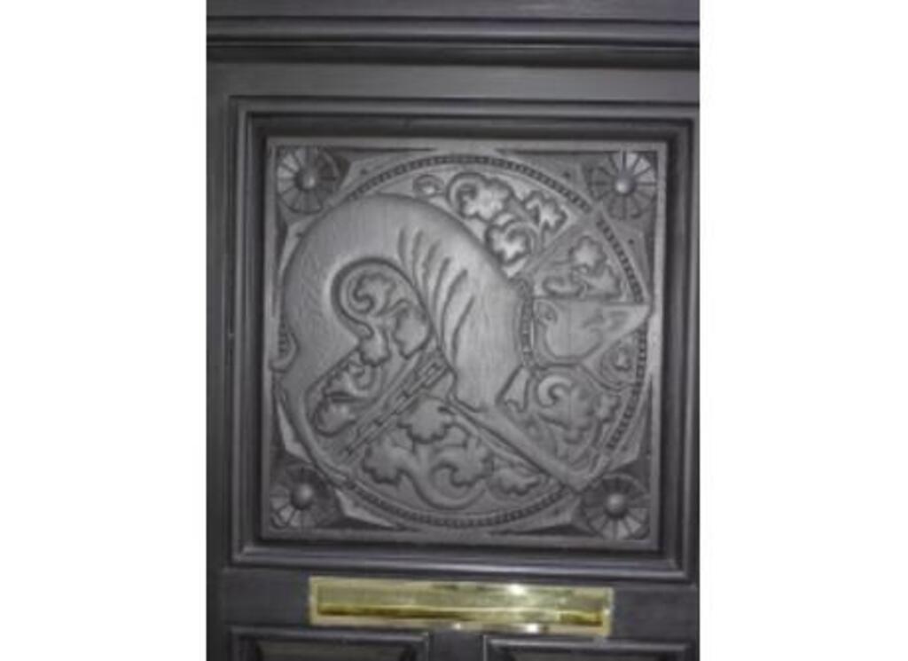 On the door of a modernist house, close to home