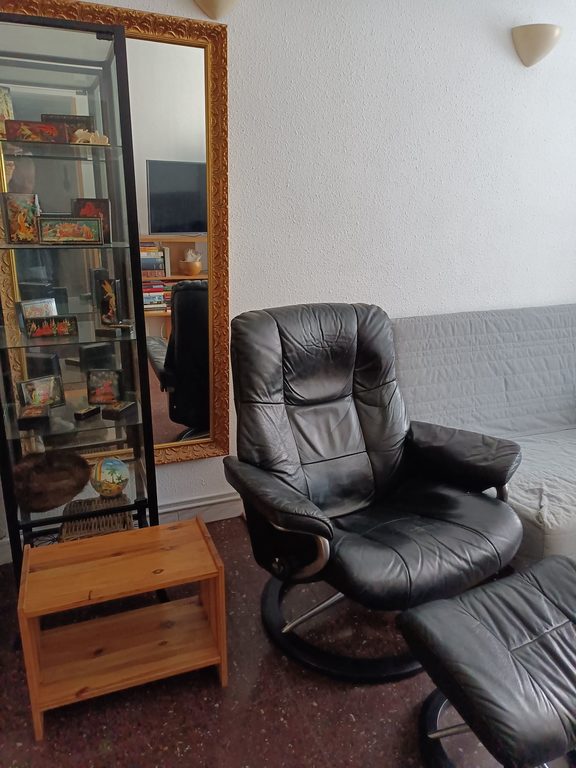 "Stressless" reclining armchair, living room