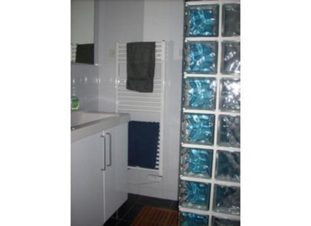 En suite shower room with shower, wash basin and bidet