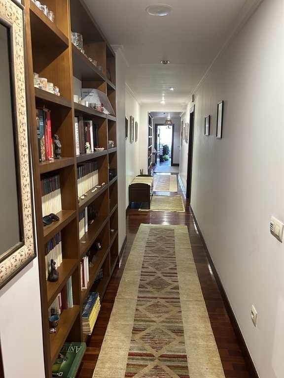 Long corridor with many books 