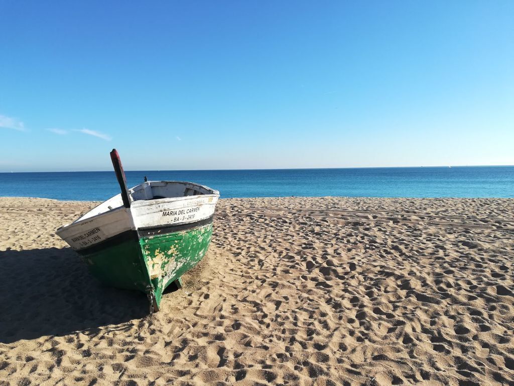Ancient fishing boats in Badalona beach. Photo taken in Christmas day!