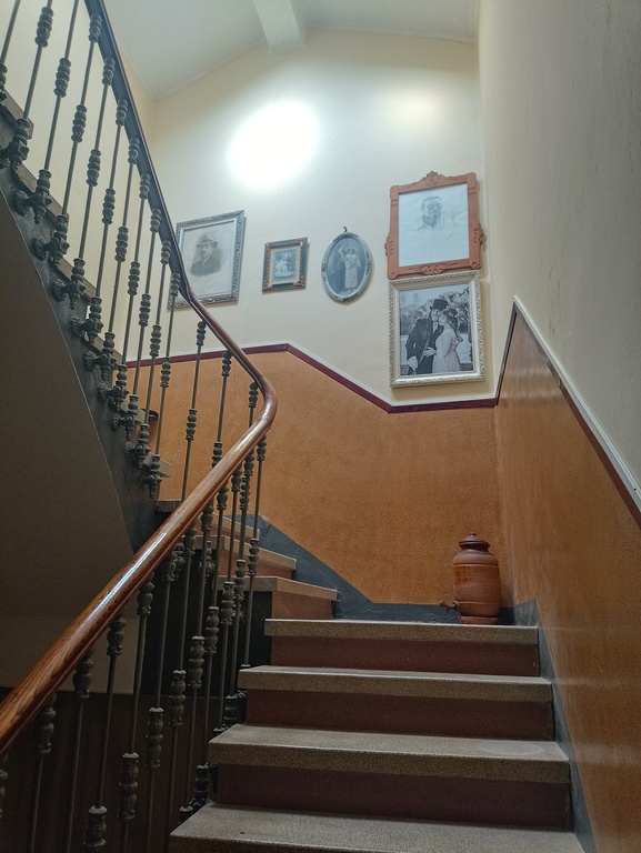 Stairs to a liltle room and storage room