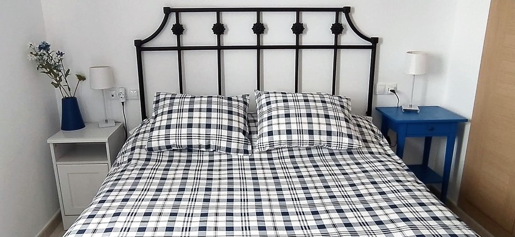 Main bedroom with ensuite bathroom. Queen bed