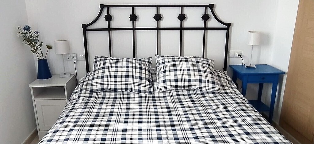 Main bedroom with ensuite bathroom. Queen bed