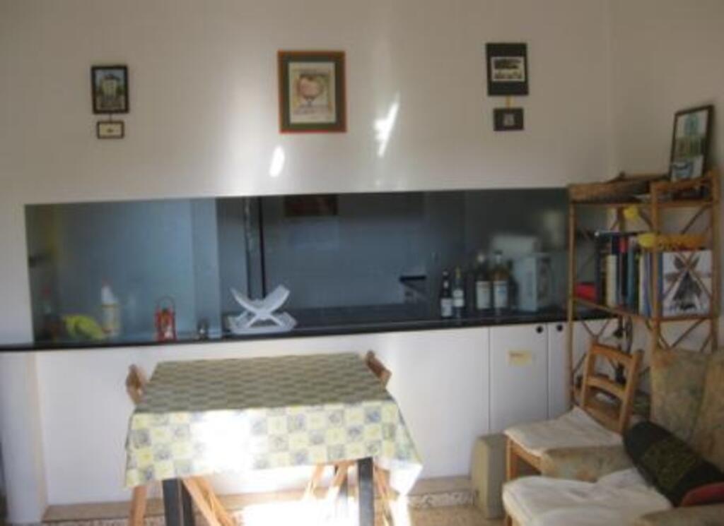 Sala y Cocina - Living Room and Kitchen