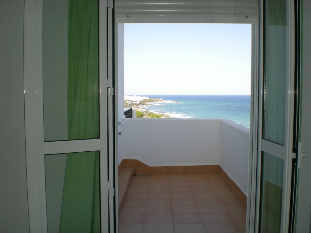 small balcony next to the main bedroom
