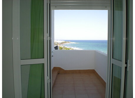 small balcony next to the main bedroom