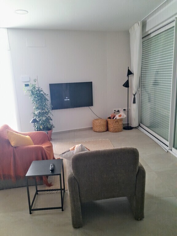 Open plan lounge, dining, kitchen.