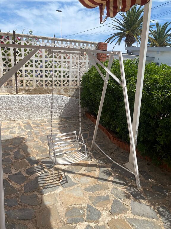 Columpio en el Jardín de la casa