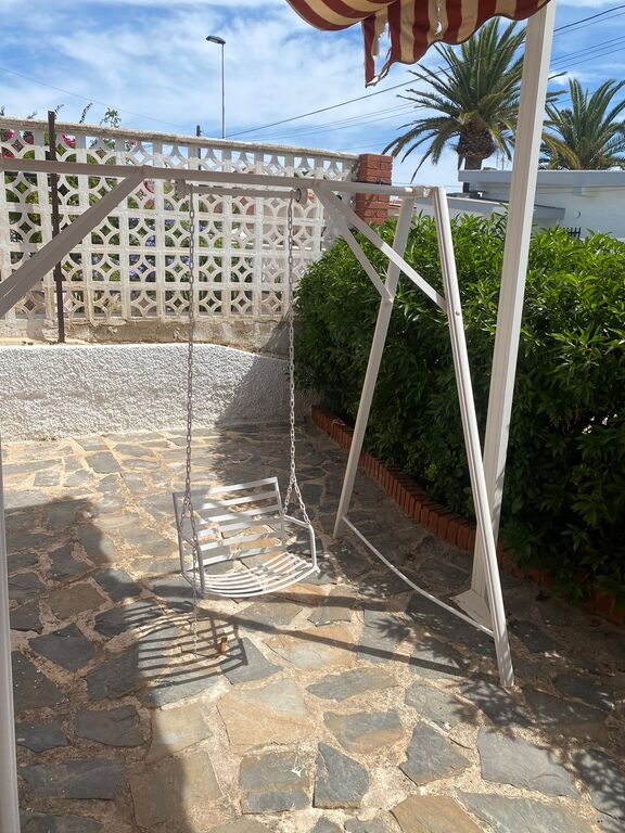 Columpio en el Jardín de la casa