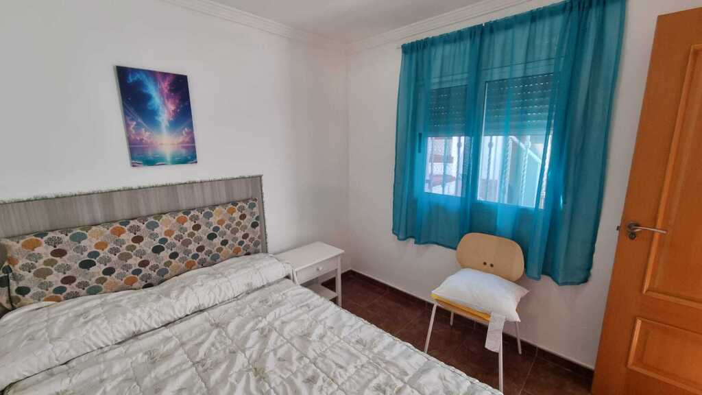 Second bedroom. The window views to the patio. 