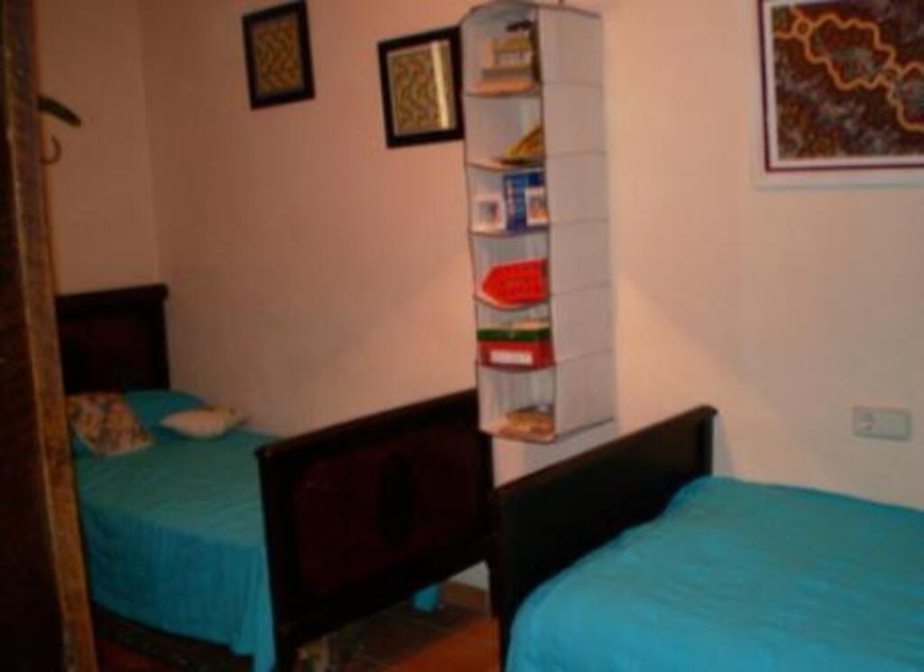 First 2 single beds bedroom 