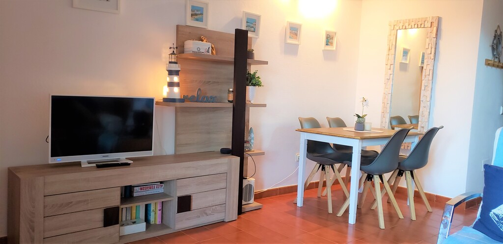 Dining area for 4, upgraded WIFI, TV and entertainment area with 32" flat screen TV with Amazon firestick and selection of films