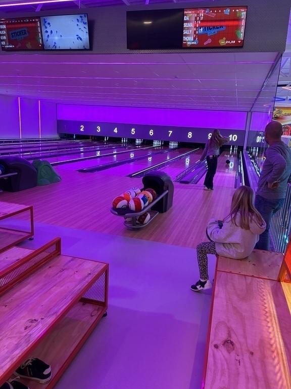 Bowling and game place. 15 min walk. 