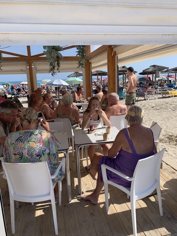 One of the beach bars near us, 10 min by bicycle.