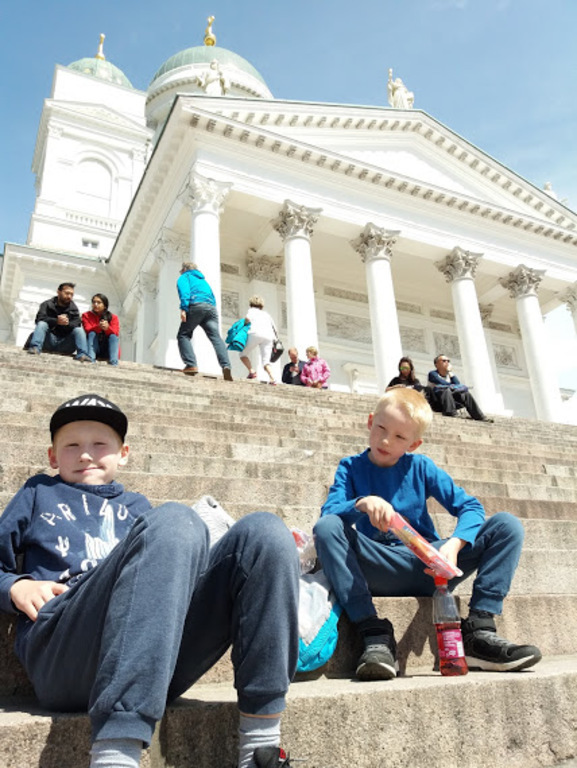 Sitting at the stairs of Helsinki Cathedral