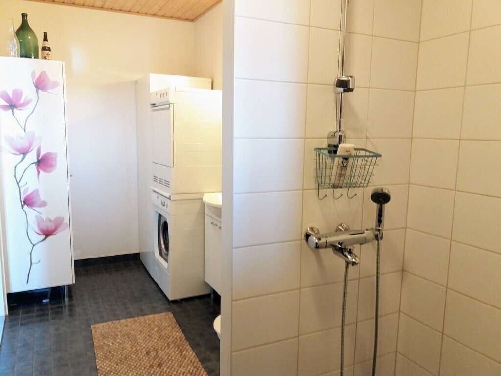 Bathroom: the washing machine and the drier.