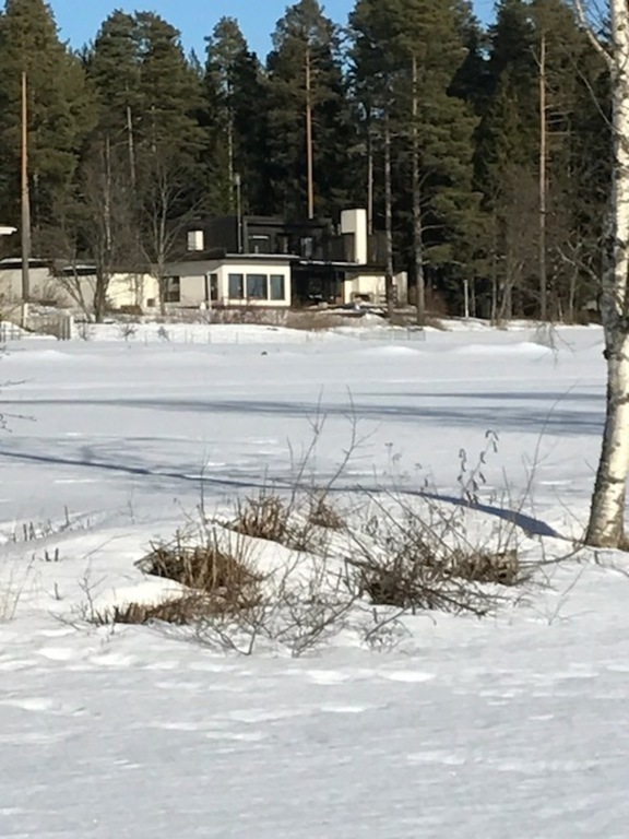 House seen from the frozen Oulujoki river
