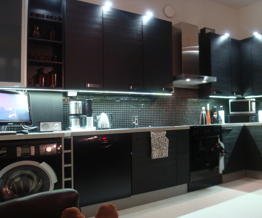 The kitchen is well-equipped.