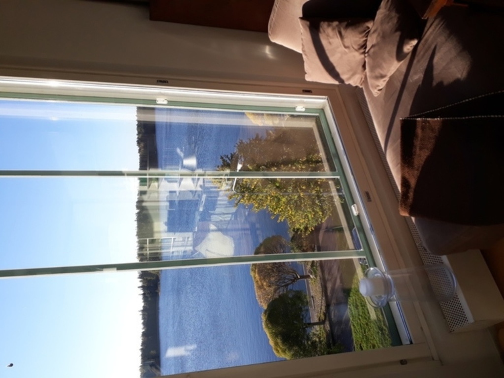 Chaise longue at the big window.