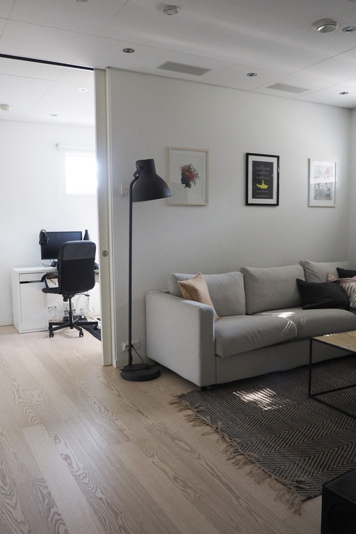 TV area with a sliding room to bedroom 3