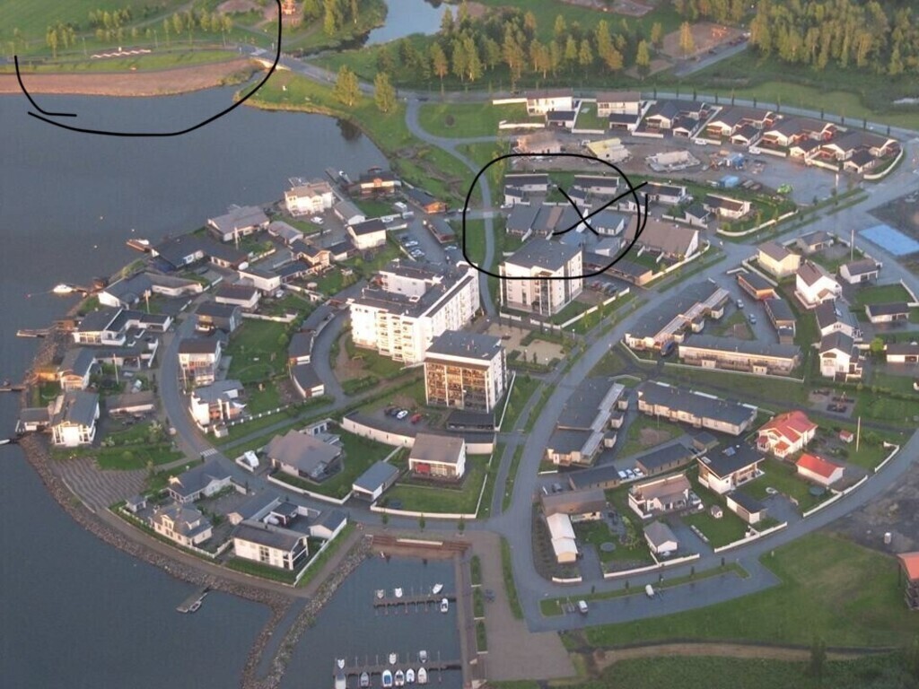 The area build on the sea. Our home marked with black.