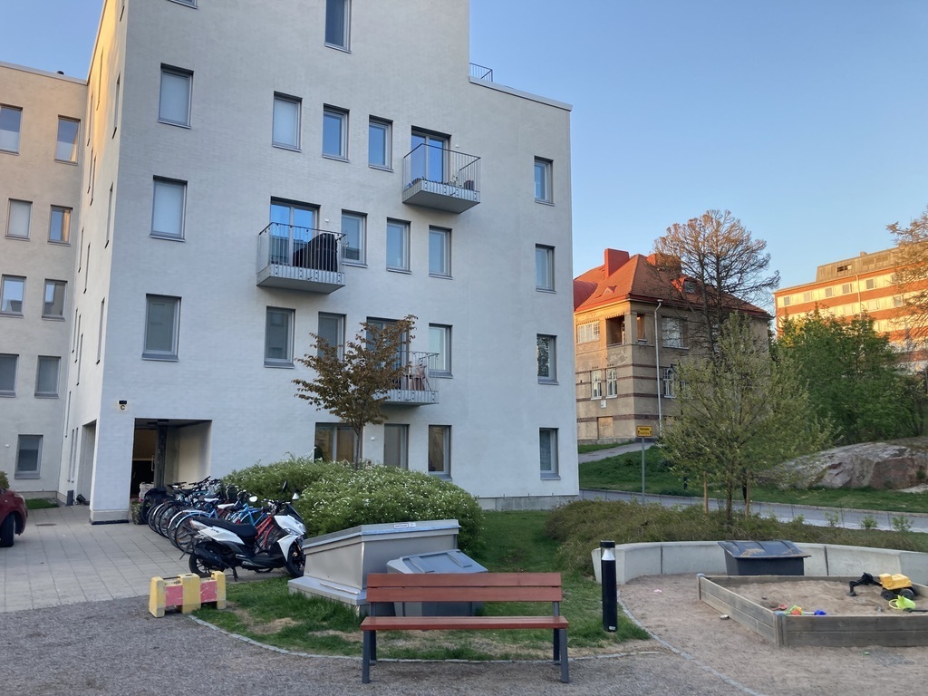 Apartment windows and terrace door in the ground floor.